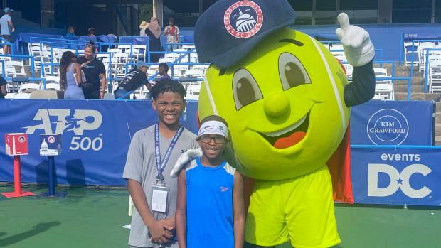 Kid Reporter Xander Dorsey at Kids Day with fellow participant Caleb Lander.